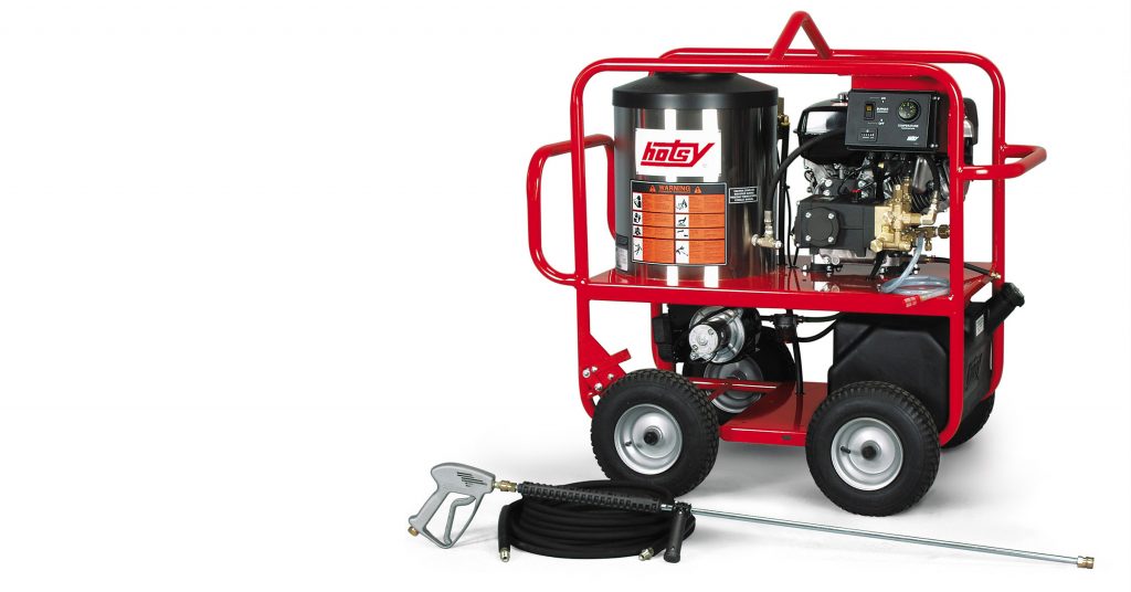 A hot water pressure washer, like this Hotsy, cuts through muck and grime much better than a traditional cold-water pressure washer.